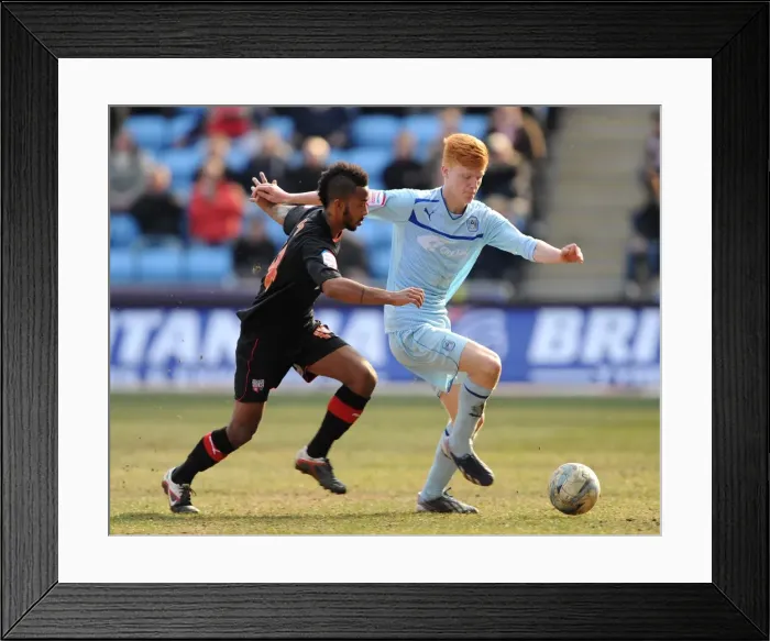 Framed Print : Challenge at Ricoh Arena: Coventry City's Shaleum Logan vs. Brentford's Ryan Haynes, Football League One, 2013 Framed Print : Challenge at Ricoh Arena: Coventry City's Shaleum Logan vs. Brentford's Ryan Haynes, Football League One, 2013