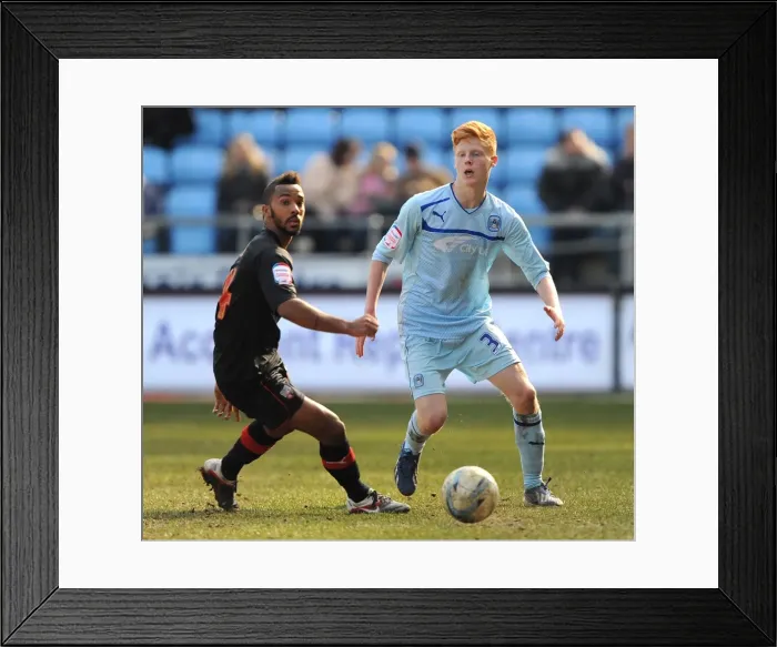 Framed Print : Battle for the Ball: Logan vs Haynes in Coventry City vs Brentford Clash (Npower League One, April 6, 2013) Framed Print : Battle for the Ball: Logan vs Haynes in Coventry City vs Brentford Clash (Npower League One, April 6, 2013)