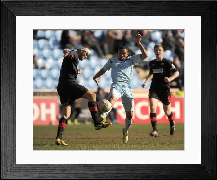 Framed Print : Battle for Football League One Supremacy: Coventry City vs Brentford - Christie vs Dean Clash at Ricoh Arena