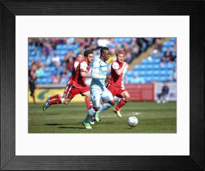 Framed Print : Clash at Ricoh Arena: Moussa vs. Vincelot - Coventry City vs. Leyton Orient, Football League One Action