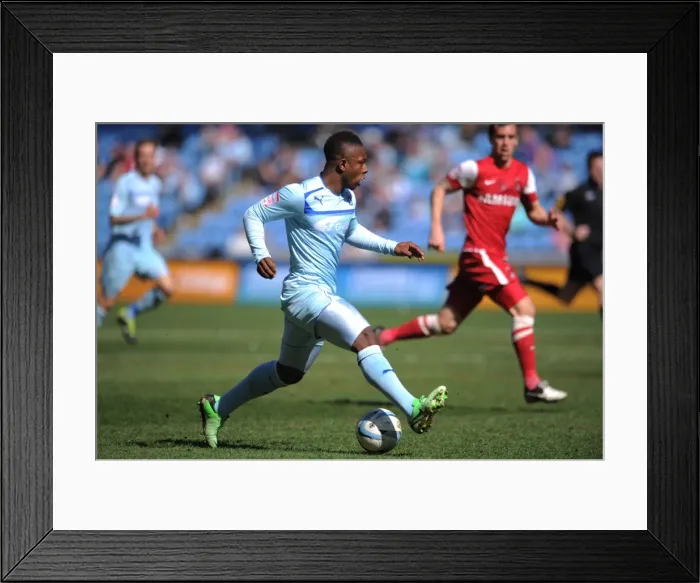 Framed Print : Franck Moussa's Charging Run at Leyton Orient's Defense - Coventry City vs Leyton Orient, Npower Football League One, Ricoh Arena (2013)