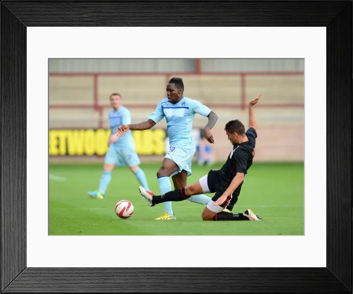 Framed Print : Intense Rivalry: Mathieu Manset vs. Gareth Evans - Coventry City vs. Fleetwood Town Pre-Season Battle (July 24, 2013, Highbury Stadium) Framed Print : Intense Rivalry: Mathieu Manset vs. Gareth Evans - Coventry City vs. Fleetwood Town Pre-Season Battle (July 24, 2013, Highbury Stadium)