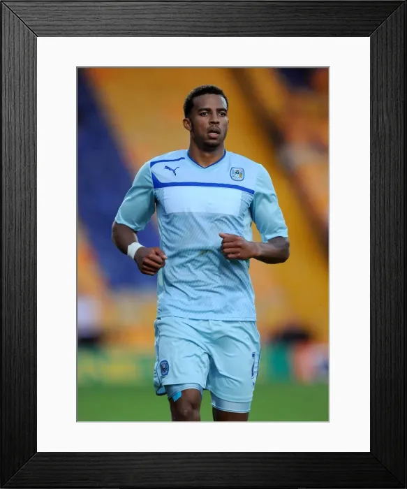 Framed Print : Cyrus Christie in Action for Coventry City at Mansfield Town Friendly (2013)