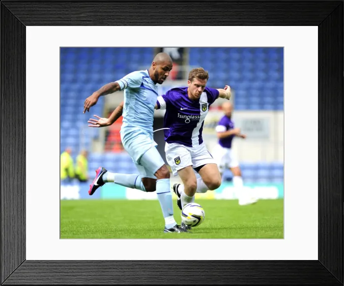 Framed Print : Clash at Kassam: Leon Clarke vs John Mullins - A Battle for Supremacy Framed Print : Clash at Kassam: Leon Clarke vs John Mullins - A Battle for Supremacy
