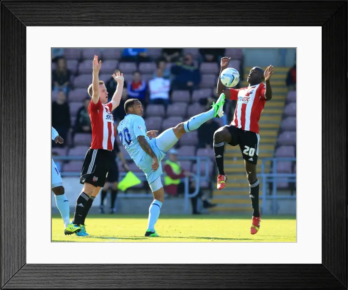 Framed Print : Battle for the Ball: Coventry City vs. Brentford - Coventry's Wilson Clashes with Forshaw and Diagouraga Framed Print : Battle for the Ball: Coventry City vs. Brentford - Coventry's Wilson Clashes with Forshaw and Diagouraga