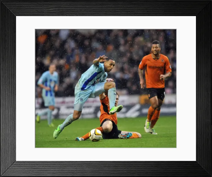 Framed Print : Intense Rivalry: McDonald vs. Wilson - Wolves vs. Coventry City Battle for the Ball (Sky Bet League 1) Framed Print : Intense Rivalry: McDonald vs. Wilson - Wolves vs. Coventry City Battle for the Ball (Sky Bet League 1)