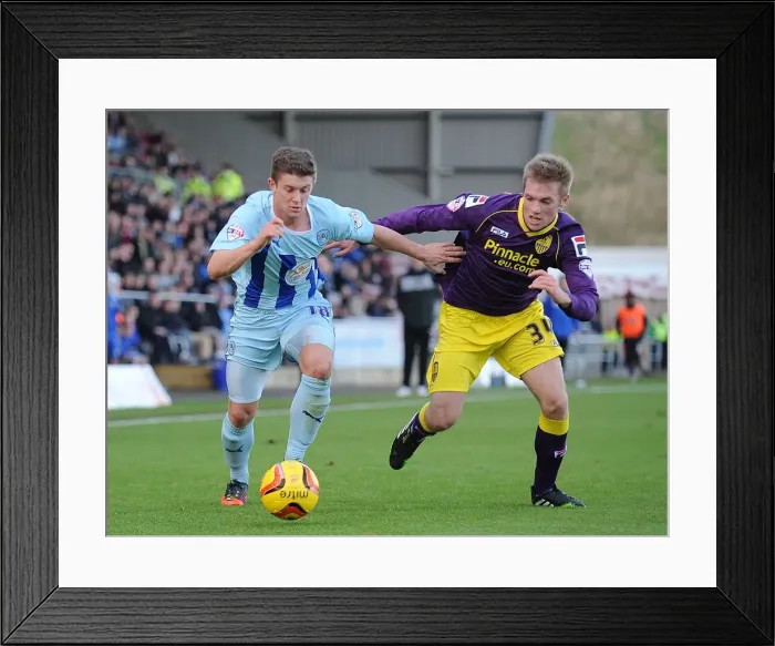 Framed Print : Battling for Control: Phillips vs. Holt in Coventry vs. Notts County League One Clash Framed Print : Battling for Control: Phillips vs. Holt in Coventry vs. Notts County League One Clash