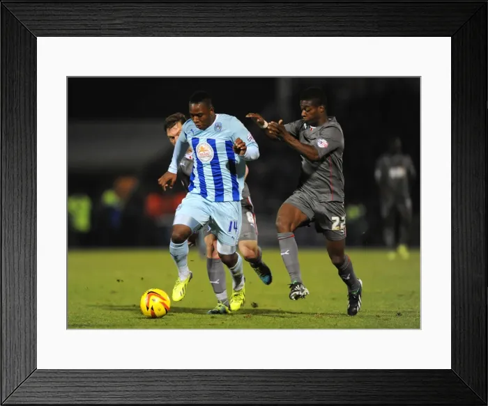 Framed Print : Battle for the Ball: Franck Moussa vs. Lee Frecklington and Kieran Agard (Sky Bet League One)
