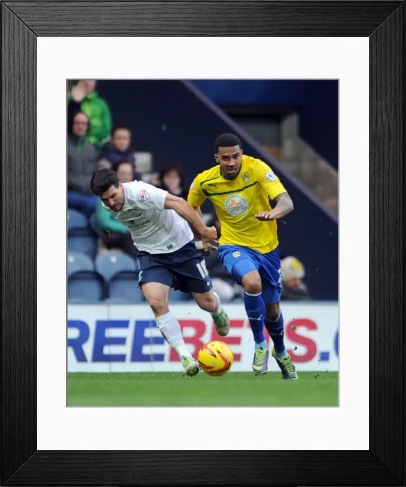 Framed Print : Intense Rivalry: Buchanan vs. Christie's Battle for Possession in Preston North End vs. Coventry City (Sky Bet League One) Framed Print : Intense Rivalry: Buchanan vs. Christie's Battle for Possession in Preston North End vs. Coventry City (Sky Bet League One)