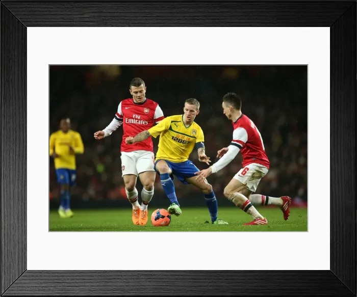 Framed Print : FA Cup Fourth Round Showdown: Wilshere and Koscielny vs. Baker - Arsenal vs. Coventry City Framed Print : FA Cup Fourth Round Showdown: Wilshere and Koscielny vs. Baker - Arsenal vs. Coventry City