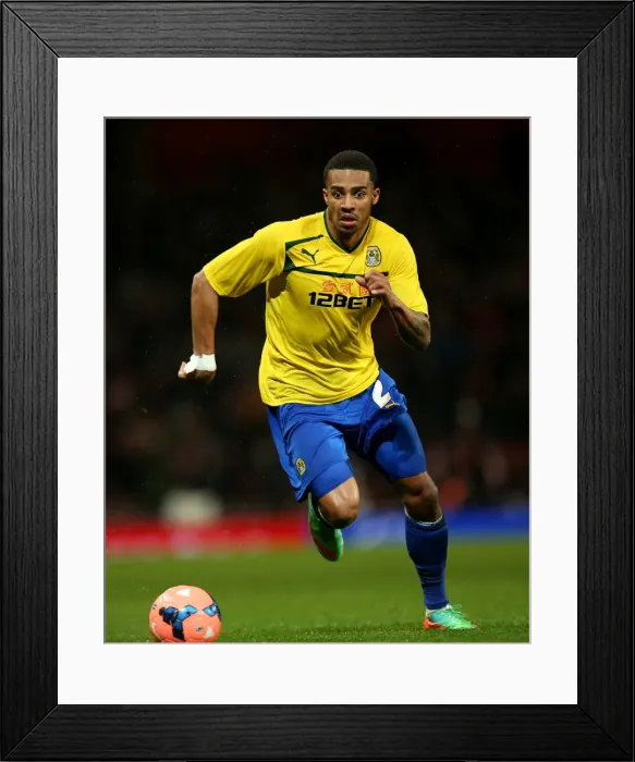 Framed Print : Coventry City's FA Cup Battle at Emirates Stadium: Cyrus Christie Stands Strong Against Arsenal (2014) Framed Print : Coventry City's FA Cup Battle at Emirates Stadium: Cyrus Christie Stands Strong Against Arsenal (2014)
