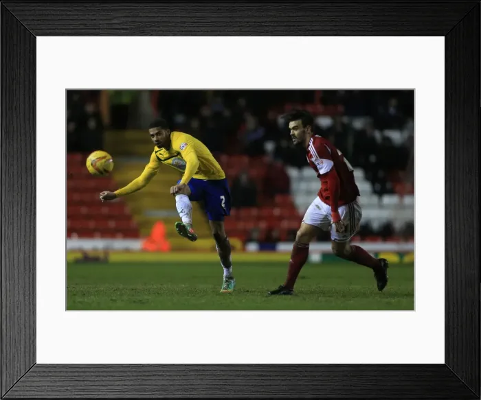 Framed Print : Tense Showdown: Cyrus Christie vs Marlon Pack in Sky Bet League One Clash Framed Print : Tense Showdown: Cyrus Christie vs Marlon Pack in Sky Bet League One Clash