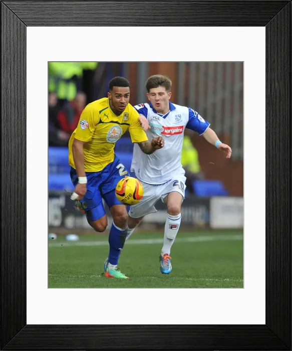 Framed Print : Battle for the Ball: Cyrus Christie vs. Matthew Kennedy - Sky Bet League One Clash Framed Print : Battle for the Ball: Cyrus Christie vs. Matthew Kennedy - Sky Bet League One Clash