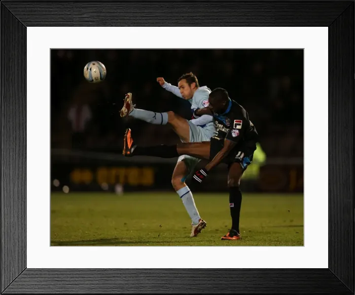 Framed Print : Blair Adams vs Lucas Akins: Intense Rivalry at Sixfields Stadium - Coventry City vs Stevenage (Sky Bet League One, 2014) Framed Print : Blair Adams vs Lucas Akins: Intense Rivalry at Sixfields Stadium - Coventry City vs Stevenage (Sky Bet League One, 2014)