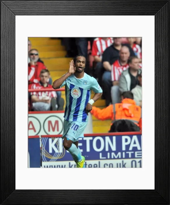 Framed Print : Nathan Delfouneso's Thrilling Debut Goal for Coventry City: A Memorable Moment at Bramall Lane Against Sheffield United (2014) Framed Print : Nathan Delfouneso's Thrilling Debut Goal for Coventry City: A Memorable Moment at Bramall Lane Against Sheffield United (2014)