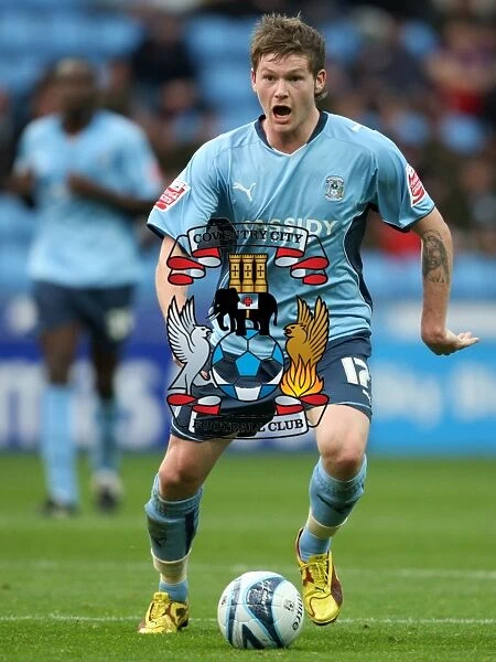 Action-Packed Moment: Aron Gunnarsson vs. Reading (Championship 2009) - Coventry City Midfielder Thrills the Crowd