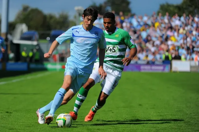 Framed Print : Adam Barton Outsmarts Reuben Reid: Coventry City vs. Yeovil Town in Npower League One Clash at Huish Park Framed Print : Adam Barton Outsmarts Reuben Reid: Coventry City vs. Yeovil Town in Npower League One Clash at Huish Park