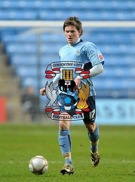 Aron Gunnarsson in Action for Coventry City against Portsmouth in FA Cup Third Round Replay at Ricoh Arena (January 12, 2010)