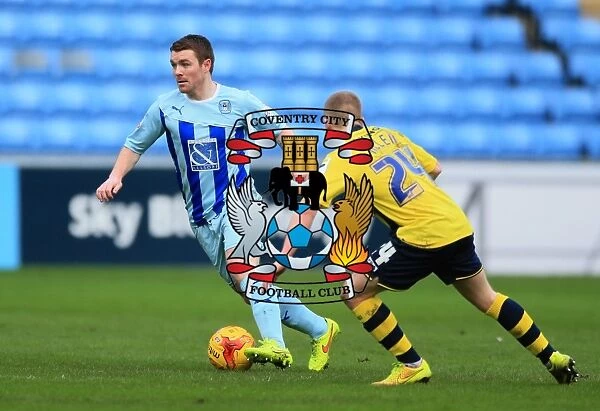Battle for the Ball: A Clash between John Fleck and Jamie Allen in Coventry City vs. Rochdale (Sky Bet League One)