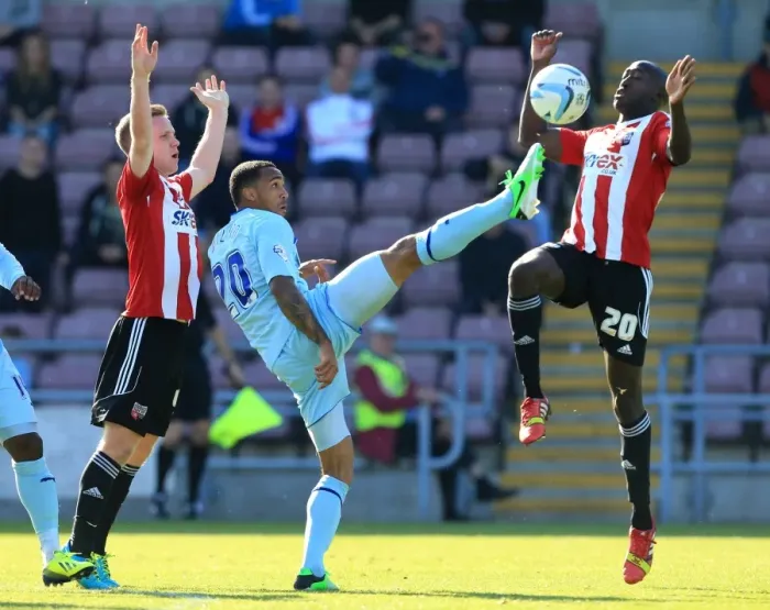 Framed Print : Battle for the Ball: Coventry City vs. Brentford - Coventry's Wilson Clashes with Forshaw and Diagouraga Framed Print : Battle for the Ball: Coventry City vs. Brentford - Coventry's Wilson Clashes with Forshaw and Diagouraga