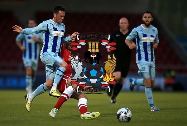 Battle for the Ball: Coventry City vs. Cardiff City in the Capital One Cup