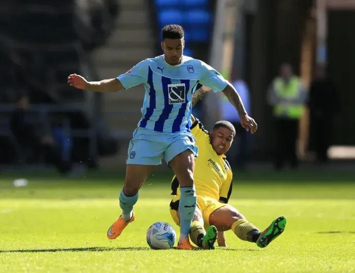 Framed Print : Battle for the Ball: Coventry City vs Colchester United in Sky Bet League One