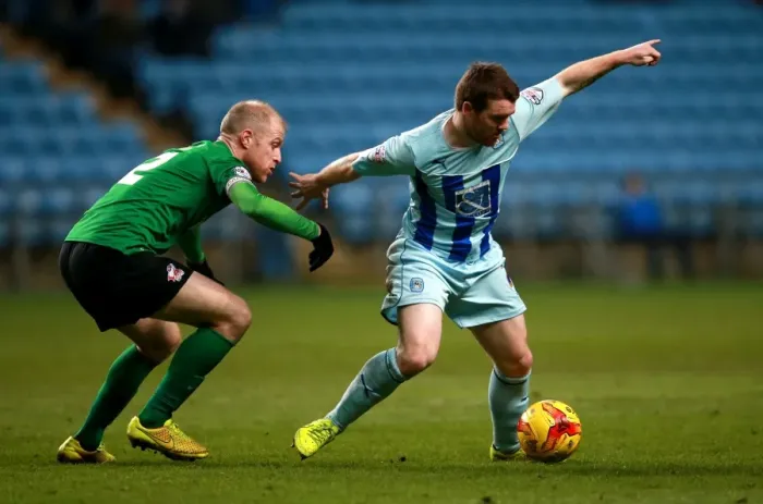 Framed Print : Battle for the Ball: Coventry City vs Scunthorpe United in Sky Bet League One - John Fleck vs Neil Bishop