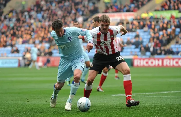 Framed Print : Battle for the Ball: Coventry City vs. Southampton - Coventry's Lukas Jutkiewicz vs. Southampton's Jos Hooiveld in Npower Championship Clash at Ricoh Arena Framed Print : Battle for the Ball: Coventry City vs. Southampton - Coventry's Lukas Jutkiewicz vs. Southampton's Jos Hooiveld in Npower Championship Clash at Ricoh Arena