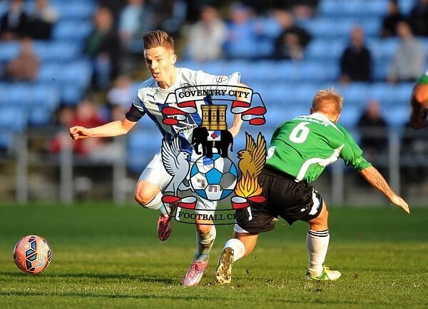 Battle for the Ball: Coventry City vs. Worcester City in FA Cup First Round - James Maddison vs. Danny Jackman
