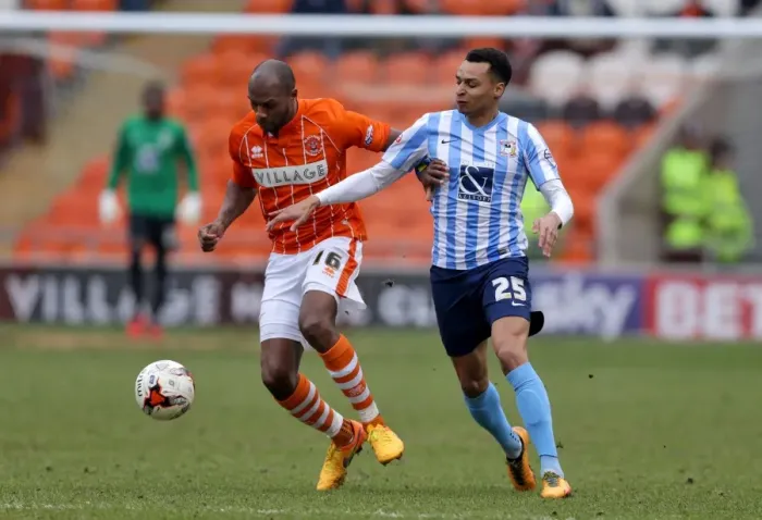 Framed Print : Battle for the Ball: Emmerson Boyce vs. Jacob Murphy in Sky Bet League One Clash Framed Print : Battle for the Ball: Emmerson Boyce vs. Jacob Murphy in Sky Bet League One Clash
