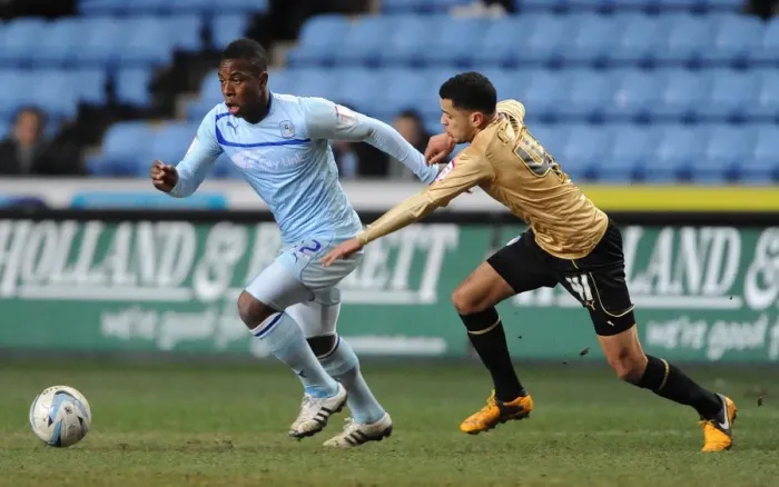 Framed Print : Battle for the Ball: Franck Moussa vs. Billy Clifford - Coventry City vs. Colchester United in Npower League One Framed Print : Battle for the Ball: Franck Moussa vs. Billy Clifford - Coventry City vs. Colchester United in Npower League One