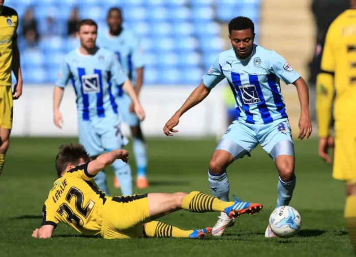 Framed Print : Battle for the Ball: Grant Ward vs Tom Lapslie - Coventry City vs Colchester United Framed Print : Battle for the Ball: Grant Ward vs Tom Lapslie - Coventry City vs Colchester United