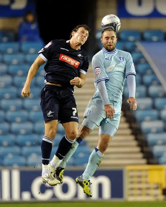 Framed Print : Battle for the Ball: Henderson vs. McPake in Millwall vs. Coventry City Championship Clash Framed Print : Battle for the Ball: Henderson vs. McPake in Millwall vs. Coventry City Championship Clash
