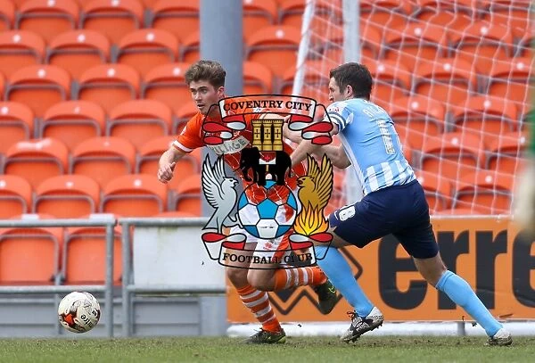 Battle for the Ball: Higham vs. Ricketts in Sky Bet League One Clash between Blackpool and Coventry City (2015-16)