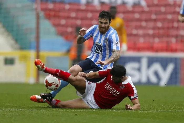 Framed Print : Battle for the Ball: Kasim vs. Vincelot - Swindon Town vs. Coventry City (Sky Bet League One) Framed Print : Battle for the Ball: Kasim vs. Vincelot - Swindon Town vs. Coventry City (Sky Bet League One)