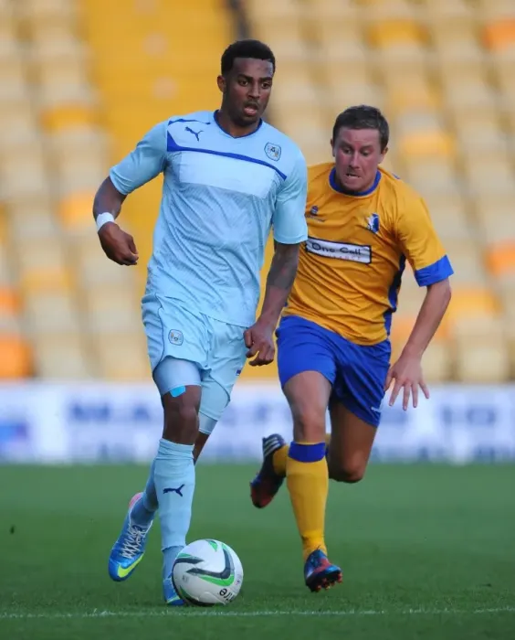 Framed Print : Battle for the Ball: McGuire vs. Christie, Mansfield Town vs. Coventry City Friendly Framed Print : Battle for the Ball: McGuire vs. Christie, Mansfield Town vs. Coventry City Friendly