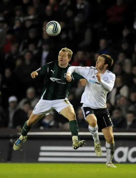 Framed Print : Battle for the Ball: McSheffrey vs. Brayford in Coventry City's Championship Showdown at Derby County Framed Print : Battle for the Ball: McSheffrey vs. Brayford in Coventry City's Championship Showdown at Derby County