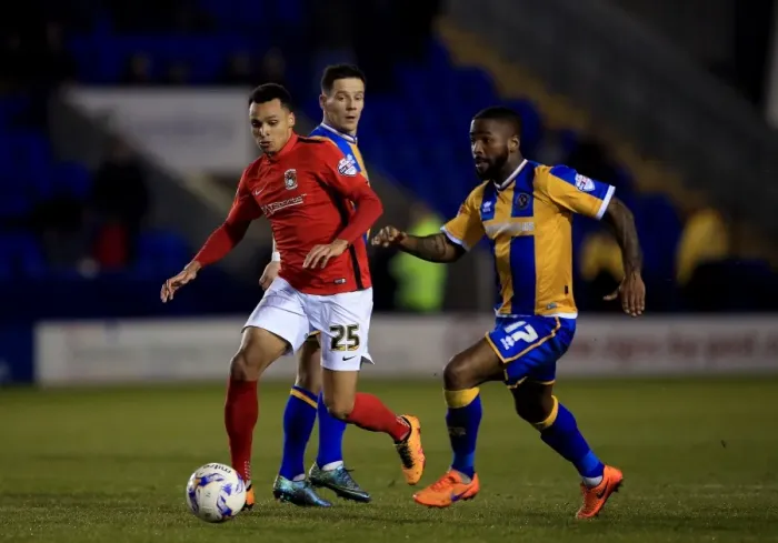Framed Print : Battle for the Ball: Murphy vs. Ogogo in Intense Sky Bet League One Rivalry Framed Print : Battle for the Ball: Murphy vs. Ogogo in Intense Sky Bet League One Rivalry