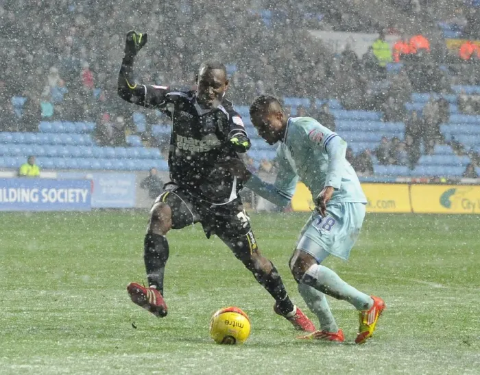 Framed Print : Battle for the Ball: Nimely vs. Sonko - Coventry City vs. Ipswich Town Championship Showdown (04-02-2012, Ricoh Arena) Framed Print : Battle for the Ball: Nimely vs. Sonko - Coventry City vs. Ipswich Town Championship Showdown (04-02-2012, Ricoh Arena)