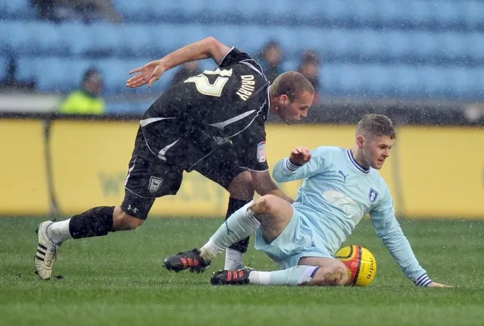 Framed Print : Battle for the Ball: Norwood vs. Drury in Coventry City vs. Ipswich Town Championship Clash Framed Print : Battle for the Ball: Norwood vs. Drury in Coventry City vs. Ipswich Town Championship Clash