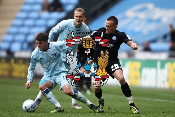 Battle for the Ball: Norwood vs. Taylor - Coventry City vs. Peterborough United, Npower Championship (07-04-2012)