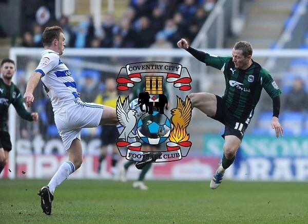 Battle for the Ball: Pearce vs. McSheffrey in the Npower Championship Clash between Coventry City and Reading (11-02-2012)