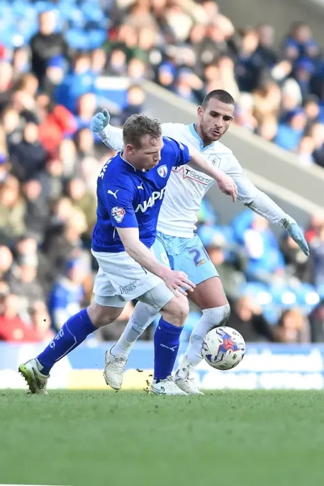 Framed Print : Battle for the Ball: Ritchie Humphries vs. Marcus Tudgay - Sky Bet League One Clash at Chesterfield's Proact Stadium Framed Print : Battle for the Ball: Ritchie Humphries vs. Marcus Tudgay - Sky Bet League One Clash at Chesterfield's Proact Stadium