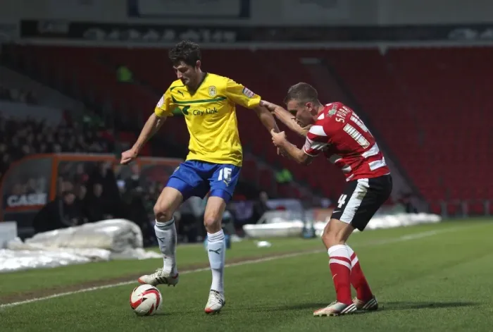 Framed Print : Battle for the Ball: Tommy Spurr vs. Adam Barton, Doncaster Rovers vs. Coventry City, Npower Football League One Framed Print : Battle for the Ball: Tommy Spurr vs. Adam Barton, Doncaster Rovers vs. Coventry City, Npower Football League One