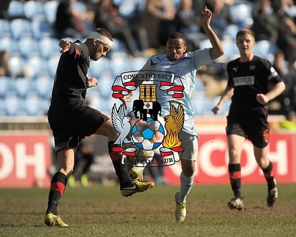 Battle for Football League One Supremacy: Coventry City vs Brentford - Christie vs Dean Clash at Ricoh Arena