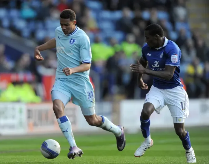 Framed Print : Battle at The King Power Stadium: Lloyd Dyer vs Cyrus Christie - Npower Championship Clash (03-03-2012) Framed Print : Battle at The King Power Stadium: Lloyd Dyer vs Cyrus Christie - Npower Championship Clash (03-03-2012)
