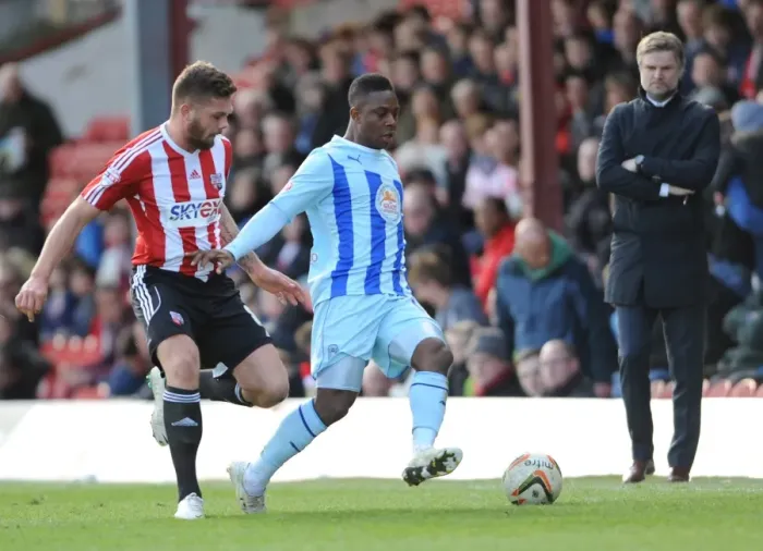 Framed Print : Battle of the Midfield: Franck Moussa vs. Jonathan Douglas - Brentford vs. Coventry City in Sky Bet League One Framed Print : Battle of the Midfield: Franck Moussa vs. Jonathan Douglas - Brentford vs. Coventry City in Sky Bet League One