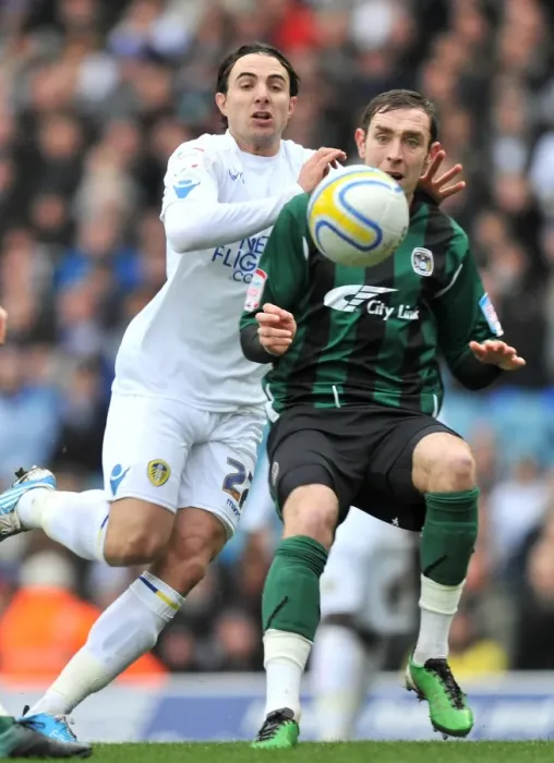 Framed Print : Battle for Supremacy: Davide Somma vs. Richard Keogh in the Npower Championship Clash between Leeds United and Coventry City at Elland Road Framed Print : Battle for Supremacy: Davide Somma vs. Richard Keogh in the Npower Championship Clash between Leeds United and Coventry City at Elland Road