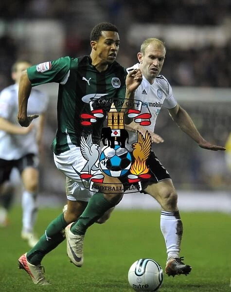 Battling for the Ball: Cyrus Christie vs. Gareth Roberts - Derby County vs. Coventry City, Npower Championship