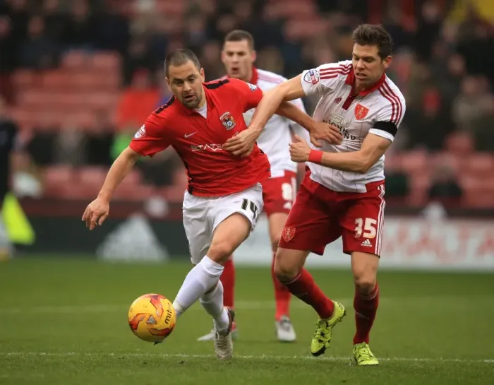 Framed Print : Battling for the Ball: Hammond vs. Cole - Sky Bet League One Rivalry at Bramall Lane Framed Print : Battling for the Ball: Hammond vs. Cole - Sky Bet League One Rivalry at Bramall Lane
